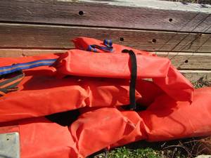 lot 1025 image: 5 size small orange life jackets
