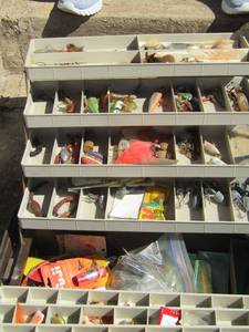 lot 1035 image: doubled sided tackle box top broken - full of various tackle fishing string plus more