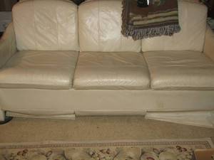 lot 713 image: LEATHER SOFA - CREAM