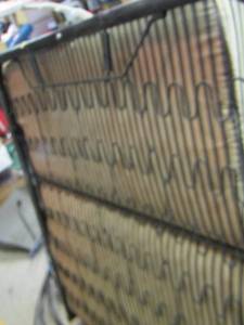 lot 717 image: metal frame cot with mattress