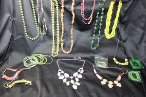 lot 225 image: (15) Selection of GREEN and complementary color jewelry. Assorted styles, ages, and materials. Separately bagged.