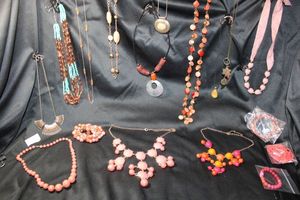 lot 226 image: (15) Selection of ORANGE and complementary color jewelry. Assorted styles, ages, and materials. Separately bagged.