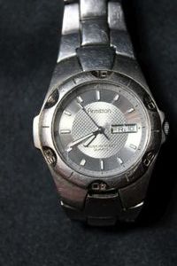 lot 214 image: Armitron daydate quartz watch (201797) model 2105 (3) 50MM 165 feet water resistant. Scratches consistent with age on band and crystal