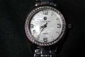 lot 203 image: Signed Daniela Swaebe (HSN - DSF Jewels) Mother of Pearl quartz Watch.