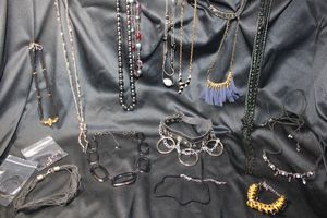lot 211 image: (15) Selection of BLACK color jewelry. Assorted styles, ages, and materials. Separately bagged.