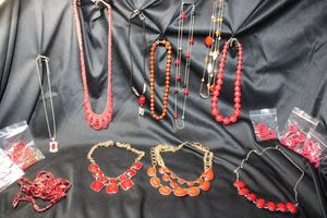 lot 213 image: (15) Selection of RED color jewelry. Assorted styles, ages, and materials. Separately bagged.