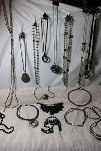 lot 216 image: (15) Selection of BLACK color jewelry. Assorted styles, ages, and materials. Separately bagged.