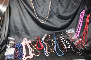 lot 236 image: (30) Acrylic necklaces. Assorted styles, colors, ages and designs.