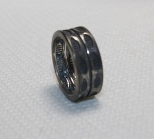 lot 30 image: Sterling Silver band ring. Size 5. Marked with hallmark W and 925 inside. 5.0 gr approx