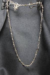 lot 26 image: Sterling Silver glass ball station bead necklace on metal chain. Youth size. 12L. Marked 925 on spring ring and catch. Heart dangle. 3.4 gr approx