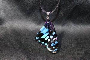 lot 4 image: Sterling Silver artisan crafted butterfly wing pendant on 18L corded necklace. Marked 925 on bale. Pendant 2.75L