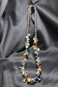 lot 16 image: Sterling Silver aroura borealis bead and fancy glass bead necklace. Marked 925 on spring ring clasp.