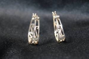 lot 3 image: Sterling Silver hoop poststud earrings with scroll filigree design. Marked 925 inside. 3.4 gr approx