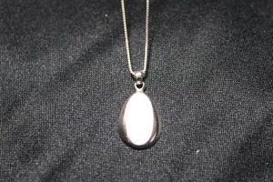lot 35 image: Sterling Silver Italian box chain 16L necklace with Mother of Pearl pendant. Marked 925 Ital near clasp and 925 on spring ring clasp. Pendant marked 925 inside bale. 3.2 gr approx