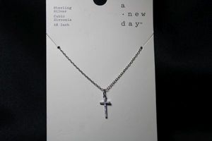 lot 37 image: Sterling Silver and CZ pave cross necklace by A New Day on retail card. Marked 925 on clasp and card. 18L.