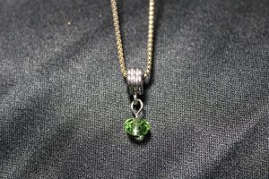lot 34 image: Sterling Silver Italian popcorn link 16L necklace with pendant charm. Marked 925 Italy BB. Spring Ring clasp. Has original retail tag of $45. Charm unmarked. 4.1 gr approx