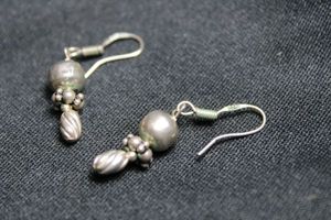 lot 42 image: Sterling Silver vintage ball bead dangle French ear wire earrings. 1.25L. Marked 925 on both ear wires. 2.8 gr approx