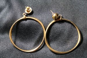lot 53 image: Sterling Silver Italian vermeil (gold over sterling) poststud earrings with attached full twisted hoops. 1.25W. Marked 925 Ital LIRM on each earring. 4.9 gr approx