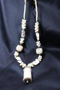 lot 81 image: Carved bone Good Luck Necklace