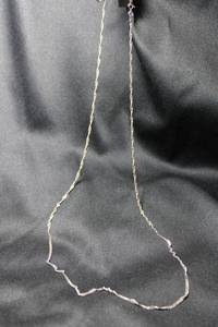 lot 84 image: Sterling Silver Italian curbed flat link chain necklace. Long 30L. Marked 925 Italy near spring ring clasp. Chromium finish. 6.0 gr approx