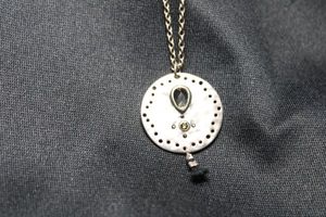 lot 110 image: Signed Sterling Silver Silpada cable chain necklace with faceted crystal accent disc pendant. 16L with 2 extender. Marked 925 on back of pendant with Silpada hallmark. Also has Silpada jewelry hang tag with hallmark. 8.0 gr approx