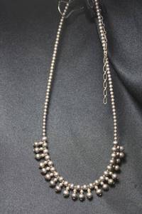 lot 116 image: Sterling Silver silversmith artisan created vintage ball bead dangle necklace. Marked 925 on lobster clasp. 14L with 4 extender. 16.8 gr approx