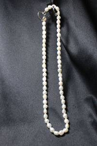 lot 118 image: Baroque Culture pearl necklace with Sterling Silver spring ring clasp. Marked 925. 17L