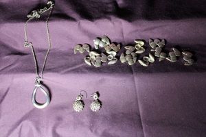 lot 342 image: Signed Fossil jewelry. Includes necklace, earrings and metal beads. All marked.