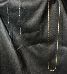 lot 134 image: Sterling Silver 18L necklace. Marked 925 and a sterling ball bead station necklace 15L with sterling lobster clasp. Marked 925.