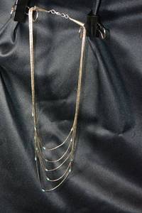 lot 136 image: Sterling Silver 5-strand silversmith artist created liquid silver bead and Turquoise necklace with cone ends and shepherds crook clasp.
