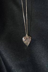 lot 146 image: Sterling Silver Italian box chain necklace with sterling puffed filigree heart pendant. 20L Necklace marked 925 Italy SGW. 4.0 gr approx