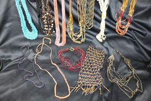 lot 336 image: (12) Glass micro bead necklaces. Varying styles and complementing materials