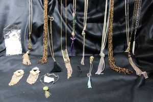 lot 305 image: (15) Vintage Tassel jewelry selection.