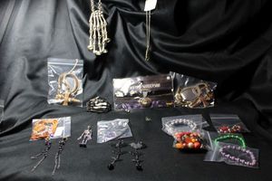 lot 314 image: Halloween Jewelry selection. Includes necklaces, bracelets, earrings, skeletons, charms plus