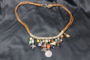 lot 358 image: Rawhide Folk Art style (tribal) bead statement necklace