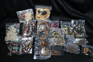 lot 267 image: (15) Wood jewelry selection.