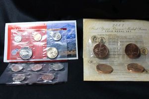 lot 374 image: Coins Uncirculated Mint Sets - (1) 2006 Denver and Philadelphia Set, (1) 2007 First Spouse Bronze Medal Set