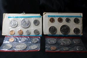 lot 387 image: Coins Uncirculated Mint Sets - (1) 1974 and (1) 1973