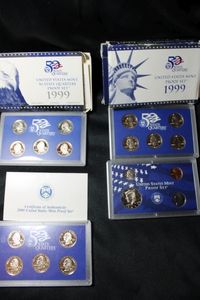 lot 407 image: Coins Proof Sets - (1) 1999, (1) 1999 Quarters, (1) 2000 Quarters