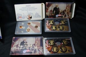 lot 411 image: Coins Proof Sets - (1) 2009 Lincoln one cent set, (1) 2009 Presidential $1 Coin set, (1) 2010 Presidential $1 coin set