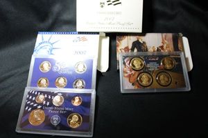 lot 413 image: Coins Proof Sets - (1) 2007 Presidential $1 Coin set, (1) 2007 Proof and Quarter set