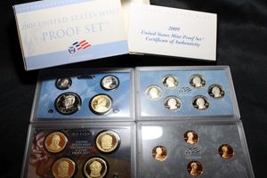 lot 415 image: Coins Proof Sets - (1) 2009 Lincoln one cent set, Presidential $1 Coin set, Proof set, and Quarter Set