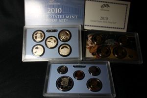 lot 416 image: Coins Proof Sets - (1) 2010 Lincoln one cent set, Presidential $1 Coin set, Proof set, and Quarter Set