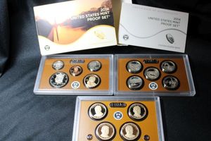 lot 422 image: Coins Proof Sets - (1) 2014 Presidential $1 Coin set, Proof set, and Quarter Set