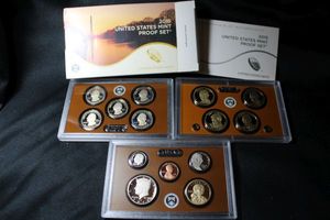 lot 423 image: Coins Proof Sets - (1) 2015 Presidential $1 Coin set, Proof set, and Quarter Set