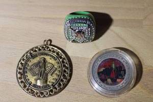 lot 192 image: Minutemen coin pendant, 1999 Hong Kong returns to China coin and Baseball Tournament Finalist ring