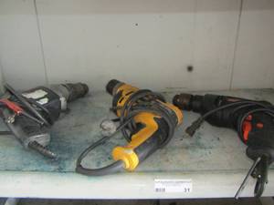 lot 31 image: Model # 0002b electric drill- DeWalt drill- Warrier electric drill