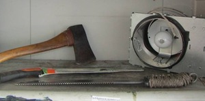 lot 33 image: Ax- Stihl hand saw new- maxim machete- outdoor light