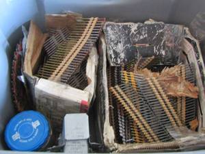 lot 7 image: tote full of roofing nails