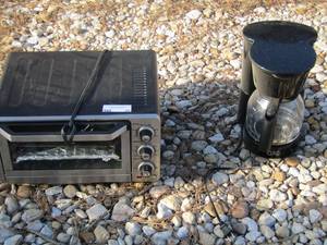 lot 29 image: Cuisinart microwave oven and a black 8 cup coffee pot